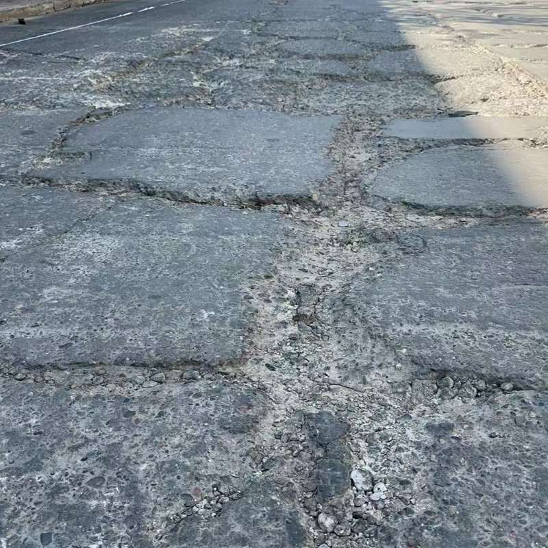 湄潭路面起砂露石子修补料